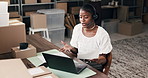 Laptop, woman and headset with paperwork in shipping for pricing enquiry, logistics FAQ and help. Black person, supply chain agent or talking to client in small business for delivery status or report