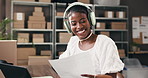 Supply chain, documents and black woman with laptop, headphones and smile with inventory. African person, startup and business owner with paperwork, sound and listening to music, logistics and audio