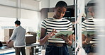Shipping, woman and tablet by glass board in small business for KPI stats, track inventory or sales. Distribution staff, person and reflection with tech for startup growth or supply chain performance