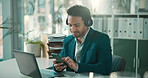 Business, headphones and happy man in office, smartphone and financial advisor with sound. Person, investor and employee with cellphone, audio and listening to music, tech and radio with celebration
