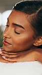 Woman, relax or sleeping with back massage in spa for physical therapy, healing or recovery. Calm, female person or customer asleep with eyes closed for relaxation treatment or stress relief in salon