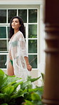 Relax, woman or swimwear with freedom at villa for peaceful view, holiday destination or serenity. Daydreaming, calm girl or confident with bikini at lodge for luxury vacation, hospitality and travel