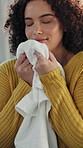 Laundry, smell or woman in house with towel, clothes maintenance or fresh scent in spring cleaning. Satisfaction, comfort or girl in home with cloth, domestic chores or inhale of fabric softener.