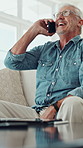 Senior man, phone call and laugh on sofa, talk and funny story with memory in living room at house. Elderly person, smartphone and happy with chat, gossip or conversation on couch in retirement home