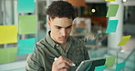 Businessman, writing or planning with tablet on glass board for schedule, tasks or agenda in office. Man, employee or brainstorming with technology, sticky note or marker for ideas in workplace