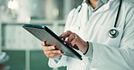 Scroll, hospital and hands of doctor on tablet for online consulting, medical research and website. Healthcare, clinic and person on digital tech for internet, telehealth and diagnosis on health app