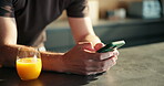 Phone, hands and freelancer with man in kitchen for networking, project consultant and talking. Virtual advisor, discussion and planning with person typing in home for remote worker and chat