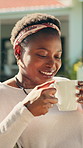 Thinking, happy and black woman with drink in garden to relax, rest and calm on weekend. Backyard, reflection and African person with coffee, beverage and tea for peaceful, thoughtful and wellness