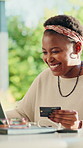 Happy woman, credit card and payment in backyard with laptop for online shopping, purchase or discount. Black person, excited or typing on patio with computer, fintech transaction and ecommerce deal.