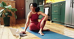 Laptop, thinking and yoga with woman in home to search for online tutorial for holistic health session. Computer, inspiration and typing with happy yogi person on floor in apartment for wellness