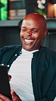 Man, tablet and laughing on video call in home for funny conversation, comic storytelling and relax. Weekend break, mature black person and happy with digital app on sofa for virtual chat and humor