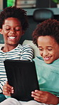 Laugh, relax or sibling in home with tablet, cartoon streaming or bonding in online game. Happy, digital or black family on sofa with tech, movie subscription or playing together in virtual activity.