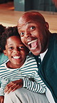 Face, father and son with selfie in home for black family connection, bonding together or silly pose. Happy parent, child or tongue out with photography in house for social media post, memory or fun.