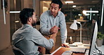 Investing, night and people with handshake in office, computer and celebration for investment profit. Stock market, shaking hands and happy trading team with fintech for bonds growth, late or success
