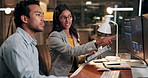 Investing, technology or people in office at night, market stats review or advice for investment. Coaching, trading team or late data analysis with computer screen, pointing or tablet for stock chart