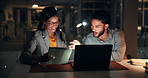 Business people, night or discussion with laptop for online research, project or deadline in office. Businessman, woman or investors working late with tablet or technology for proposal in workplace