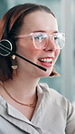 Call center, glasses and woman in office with headset, contact us and assistance in crm service. Telecom, reflection and agent in workplace with tech, online advice and explaining in client support.