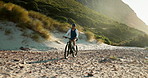 Nature, mountain and man on bicycle in morning for exercise, cardio workout and sports challenge. Countryside, travel and person cycling on bike for adventure, journey and health on outdoor trail