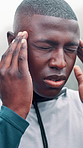 Black man, fitness and headache with injury in mist for fatigue, burnout or mental health in nature. Tired, male person or runner with sore head, pain or strain for intense workout or pressure