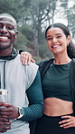 Face, outdoor and couple with exercise, smile and bonding together with wellness. Nature, fitness and man with woman, happiness and healthy with relationship, workout and training with water bottle