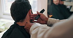 Barbershop, trim and man with grooming, hair care and style with salon treatment. Closeup, client and employee with equipment, luxury and cutting with service, appointment and clippers with beauty