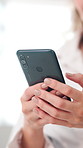 Typing, phone and hands of business woman in office for networking, online chat and email communication. Professional, workplace and person on smartphone for notification, message and connection