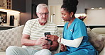Senior man, nurse and phone on sofa with talk, notification and healthcare services in retirement home. Elderly person, caregiver and help with smartphone, assisted living and wellness app at house
