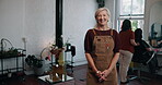 Face, mature woman or entrepreneur in hair salon with pride, customer service or beauty professional. Portrait, hairdresser or business owner with smile in startup, confident or client style makeover