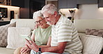 Senior couple, smile and tablet on sofa for movies, streaming or subscription in living room. Elderly man, woman or old people on couch in house together for retirement, bonding and love with tech