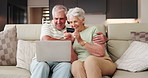 Happy, old couple and laptop on sofa with credit card, ecommerce or hug for online payment success. Married, elderly people embrace or applause in home with computer, discussion and fintech purchase.