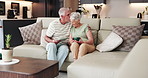 Old couple, kiss and tablet on couch for social media, streaming or subscription in living room. Elderly man, woman or senior people in house together for retirement, bonding and hug with tech