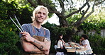 Smile, bbq and arms crossed with face of man in party for tongs, celebration and social reunion. Barbecue, happy and lunch with person and grill in nature for cookout event, holiday and cooking food