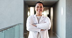 Doctor, healthcare and happy woman with arms crossed, face and pride with career ambition. Portrait, employee and professional in hospital, wellness or medical service with cardio specialist or smile