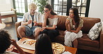 Happy people, friends and eating with pizza in home for social gathering or lunch together. Group, community or gen z with meal, takeout or fast food for bonding, interaction or feast in house