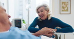 Conversation, empathy and woman with husband in hospital bed for surgery recovery, healing or treatment. Happy, retirement and senior couple with talking in medical clinic for visit with marriage.