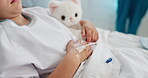 Sick, child or hands with IV drip in hospital bed for nutrition, liquid medicine or surgery recovery. Teddy bear, kid patient and fluid infusion in pediatric clinic for medical treatment and healing