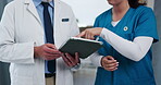 Hands, nurse and doctor with tablet in clinic for EHR system, medical results review and feedback. People, professional team or digital app with discussion on health insurance and opinion in hospital