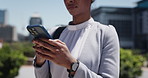 Cellphone, hands and businesswoman in city for communication, typing or email on mobile app. Technology, connectivity and female corporate employee with phone for texting online in urban town.