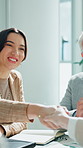 Business, woman and meeting with handshake in office for partnership, agreement and recruitment. People, shaking hands and applause for company success, promotion deal and negotiation for onboarding