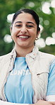 Face, volunteer and woman laugh at park for community service, non profit and smile. Outdoor, charity worker and confident person with NGO, social responsibility and funny portrait with bokeh