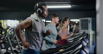 Headphones, fitness and man on treadmill in gym for running, workout or training with health. Wellness, audio tech and male person listening to music for cardio exercise on machine in sports center.