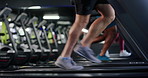 Legs, sneakers and man on treadmill, running and fitness with training, workout and energy. Healthy person, machine and athlete with wellness, endurance and cardio with exercise, steps and footwear