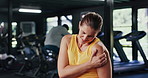 Athlete, woman and discomfort of arm pain at gym from fitness injury, muscle strain and ache. Female person, cramps and inflammation from workout accident, exercise mistake and fibromyalgia condition