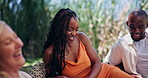 Happy, friends and picnic in nature with conversation for social gathering, gossip or bonding together. People, relax outdoor and laugh with funny discussion, summer holiday or connection on weekend.