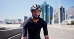 Cyclist, helmet and bike with black man in city for triathlon training, fitness and sports. Cardio challenge, wellness and cycling athlete with person outdoor for exercise, health and race workout