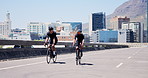 Fitness, cycling and men on bicycle in city for workout, training and exercise together for endurance. Town, talking and friends for competition, race and challenge for sports, wellness and health