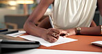 Hand, paper and writing with business woman at desk in office for accounting or finance report. Documents, pen and proposal with professional employee in financial workplace for review of contract