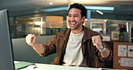 Computer, fist pump and night with designer man at desk in office for project planning success. Design, laptop and victory with creative employee in dark workplace for celebration of goals or target