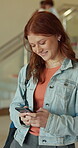 Teenager, high school and happy girl typing with phone, send message and check platform for class location. Digital schedule, reading and student in academy corridor with mobile, smile or lesson info