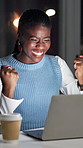 Black woman, laptop and celebration at startup, night or fist pump for achievement at media company. Happy person, writer and pc with overtime for goal, success or funding approval at creative agency